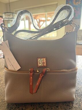 Dooney & Bourke “Alyssa” Crossbody in smoke. New with tags.